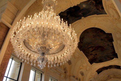 Baccarat Chandelier against the ceiling of the Petit Palais 